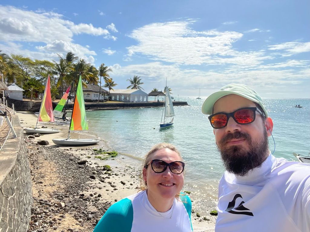Happy after our Pico sailing session! The Picos are the ones with the colorful sails in the back Happy after our Pico sailing session! The Picos are the ones with the colorful sails in the back